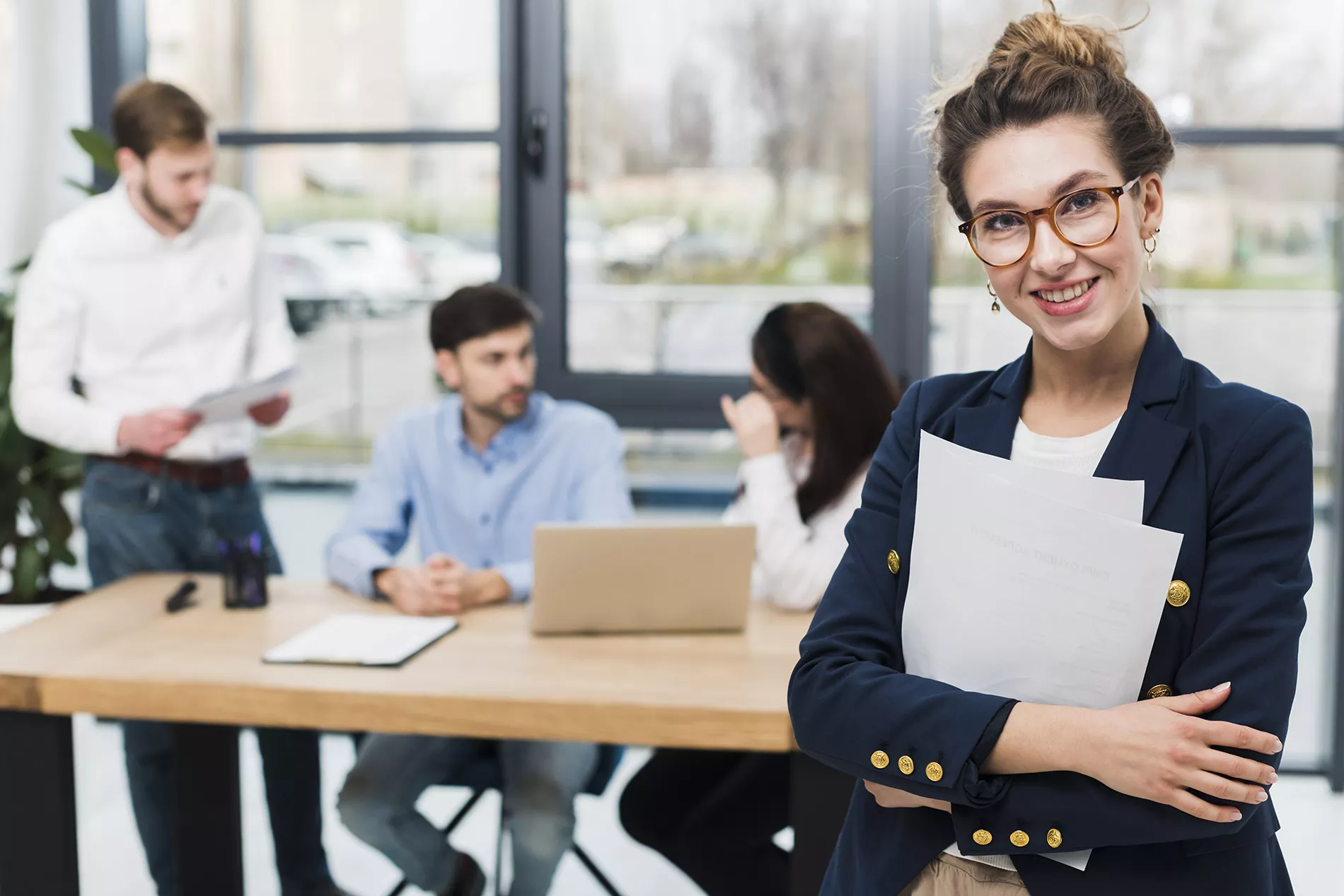 A lady standing in the office